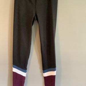 Yoga pants. Worn once. Size xs. Black, white and burgundy.